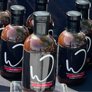 Locally made BBQ sauce  for sale at Juneteenth event.